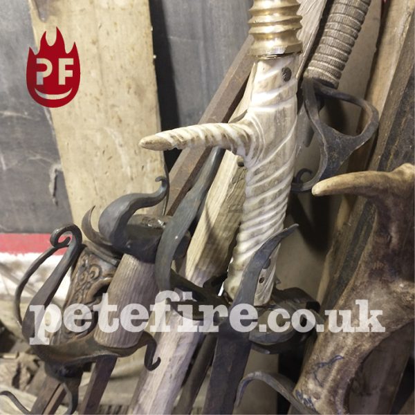 Hand forged swords and axes at the Petefire Artist Blacksmith Forge, St Albans, Herts.